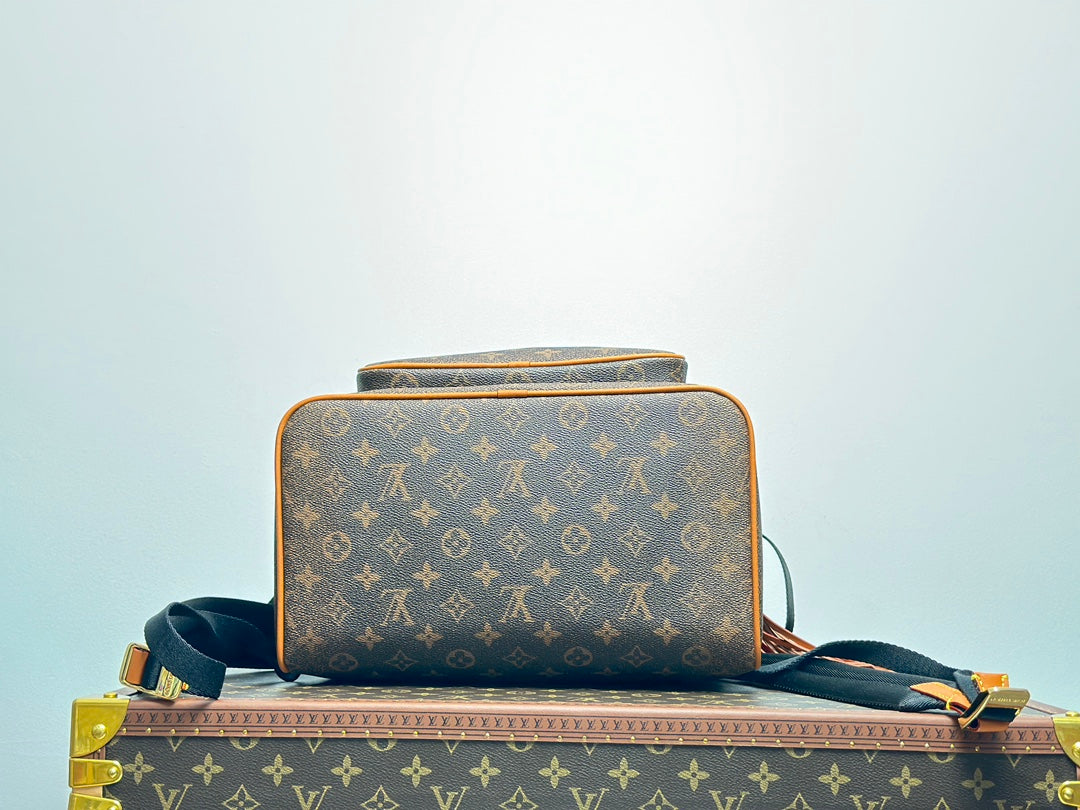 Louis Vuitton Monogram Montsouris Backpack with Fringe Tassel and Heart Charm