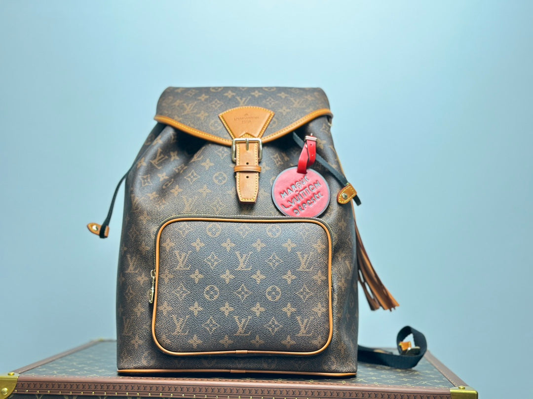 Louis Vuitton Monogram Montsouris Backpack with Fringe Tassel and Heart Charm