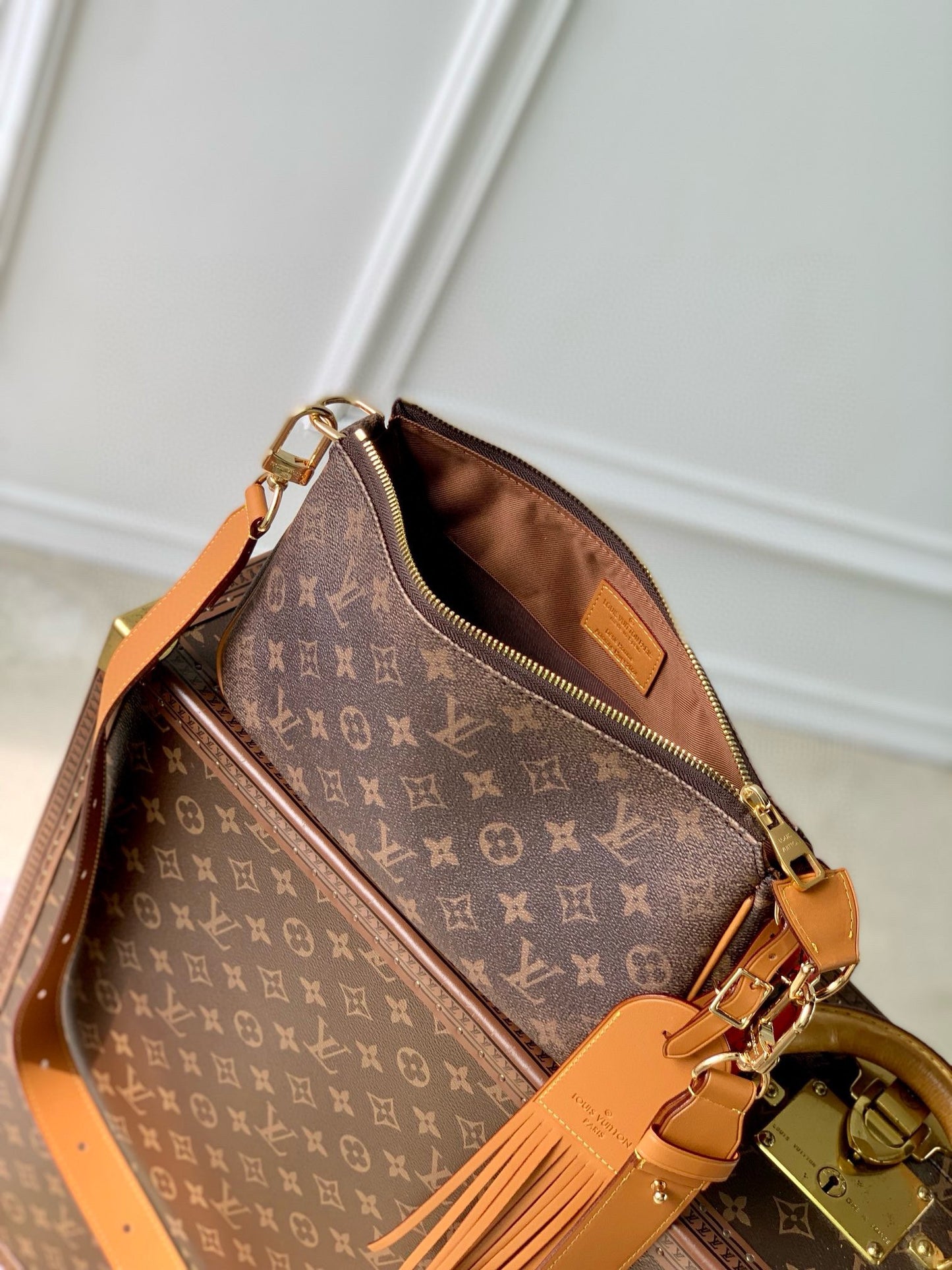 Luxury Monogram Brown Handbag with Tassel Detail - Elegant Designer Style Crossbody Bag