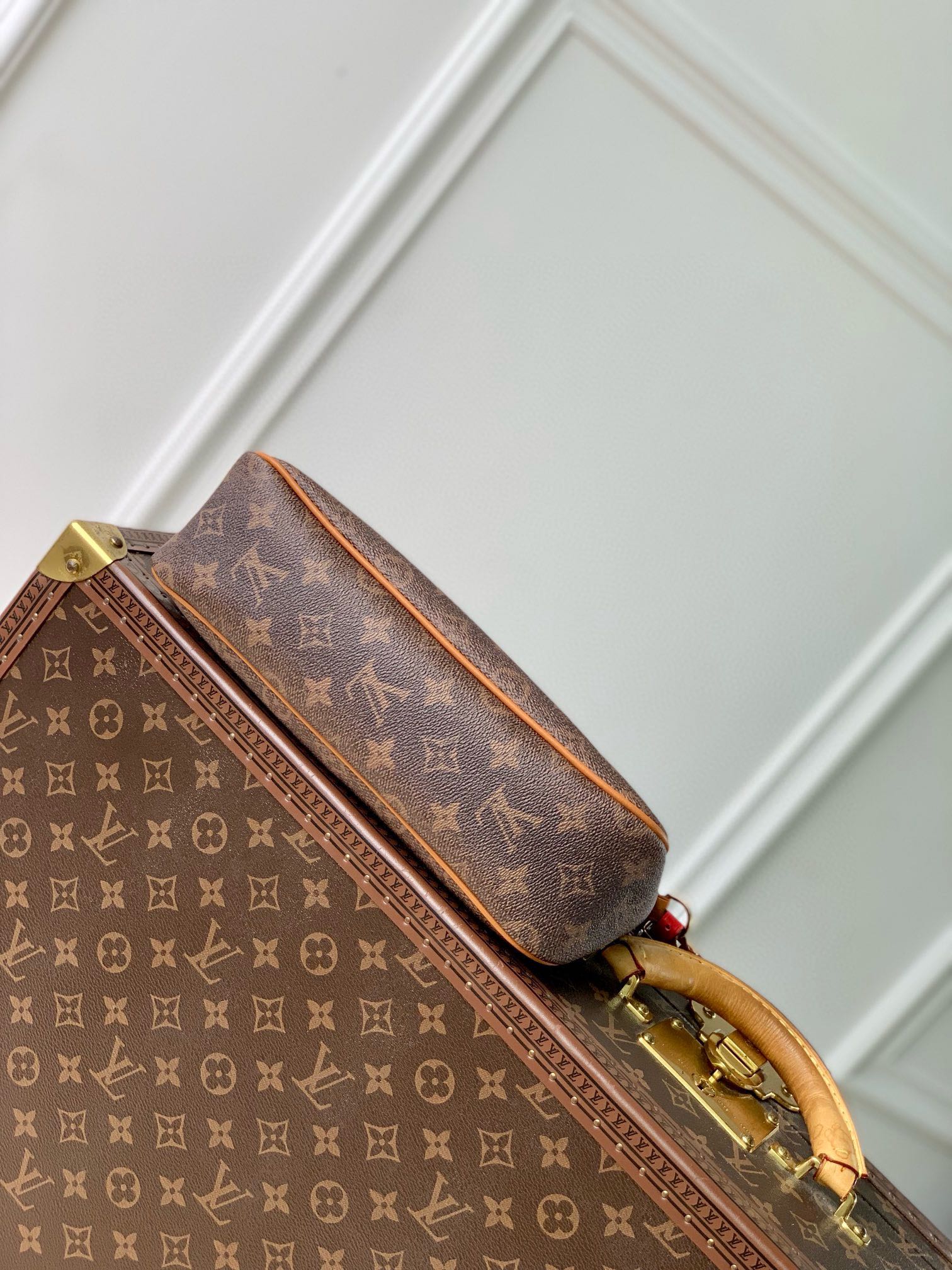 Luxury Monogram Brown Handbag with Tassel Detail - Elegant Designer Style Crossbody Bag
