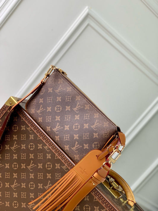 Luxury Monogram Brown Handbag with Tassel Detail - Elegant Designer Style Crossbody Bag