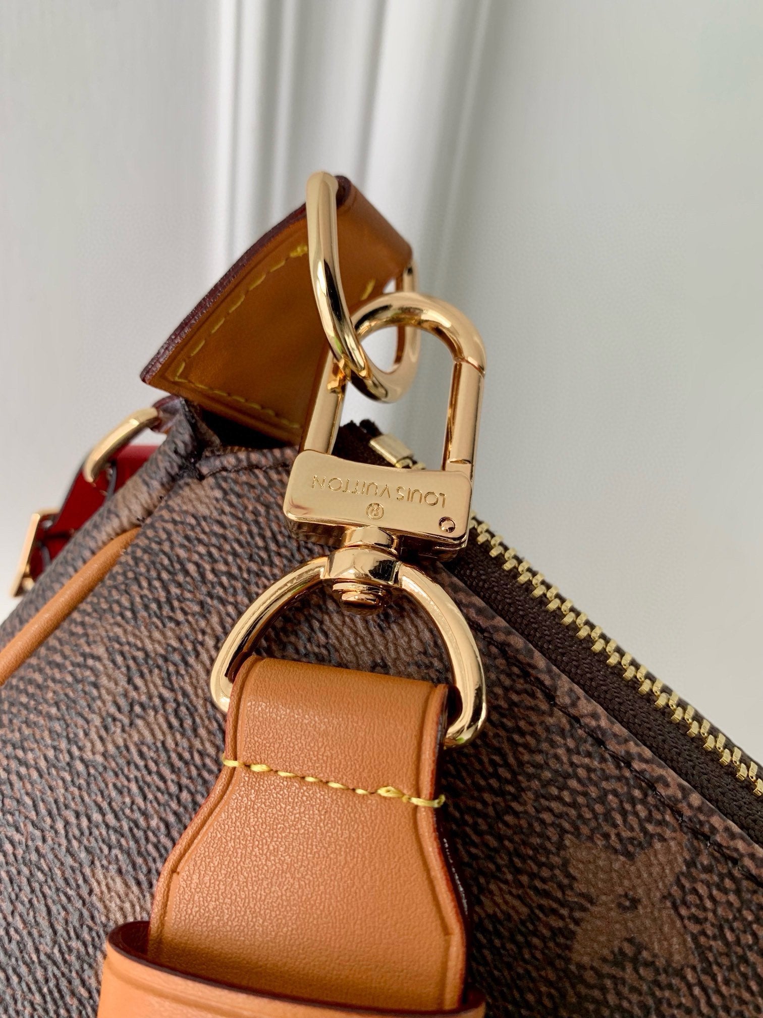 Luxury Monogram Brown Handbag with Tassel Detail - Elegant Designer Style Crossbody Bag