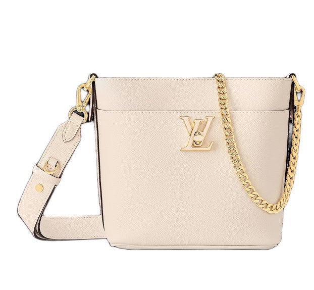 Louis Vuitton Lockme Bucket Bag in Cream Grained Leather with Gold-Tone Hardware