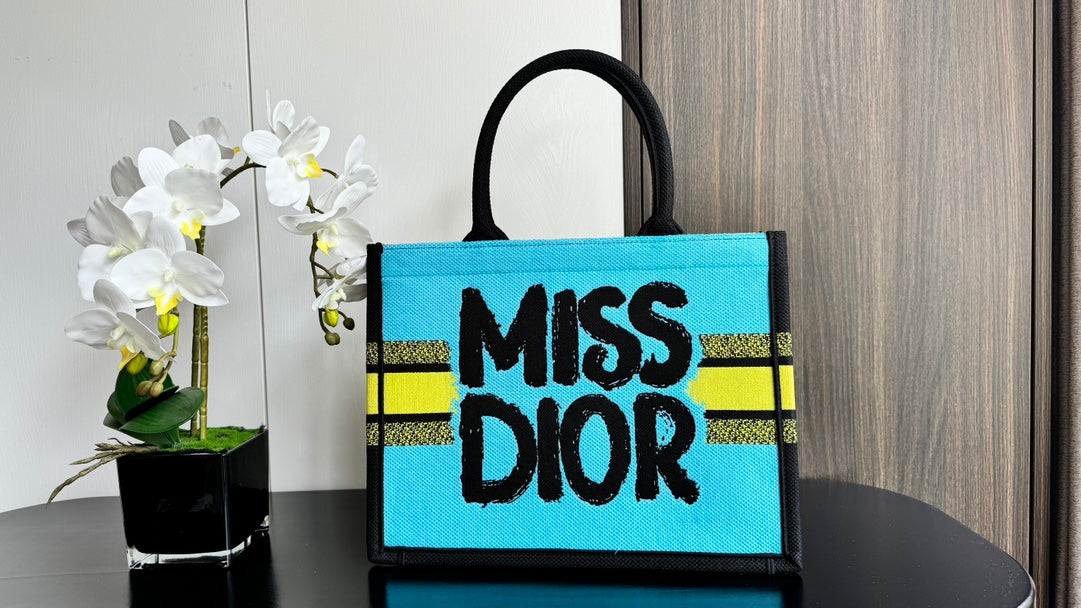Dior Vibrant Yellow Canvas Tote Bag with Black Graffiti Print