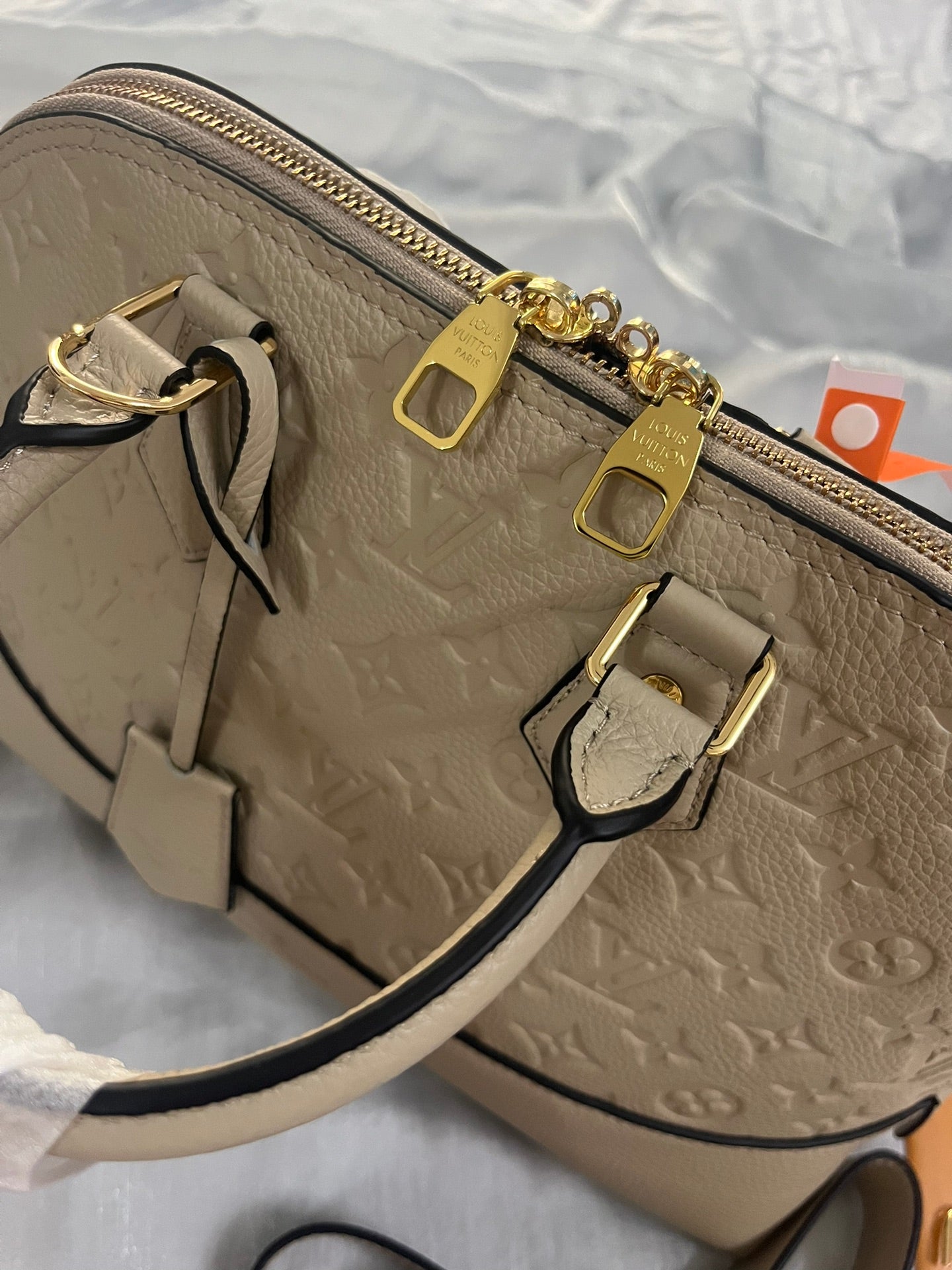 Louis Vuitton Neo Alma PM Monogram Empreinte Leather Turtledove Handbag