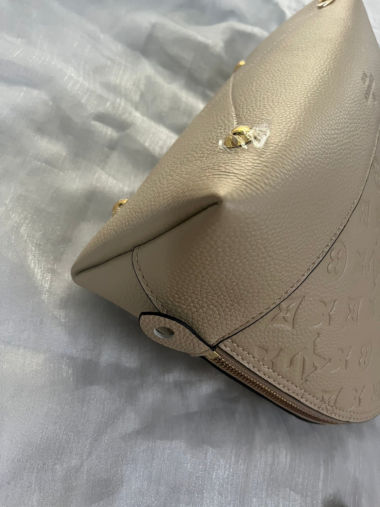 Louis Vuitton Neo Alma PM Monogram Empreinte Leather Turtledove Handbag