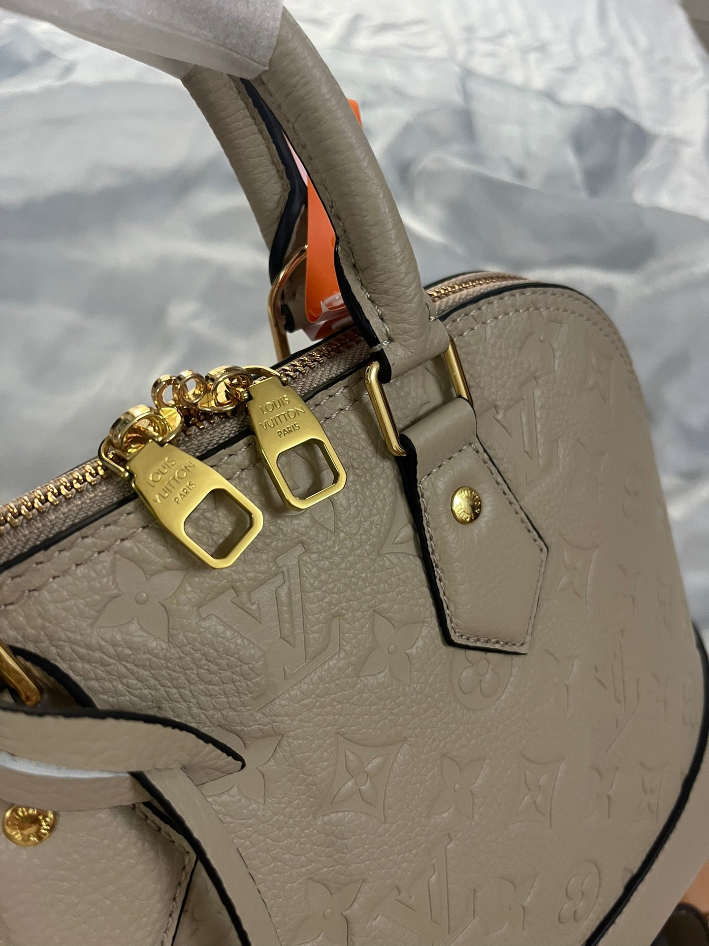 Louis Vuitton Neo Alma PM Monogram Empreinte Leather Turtledove Handbag