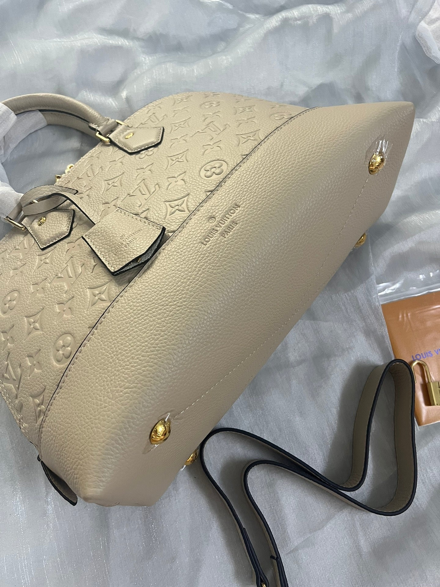Louis Vuitton Neo Alma PM Monogram Empreinte Leather Turtledove Handbag