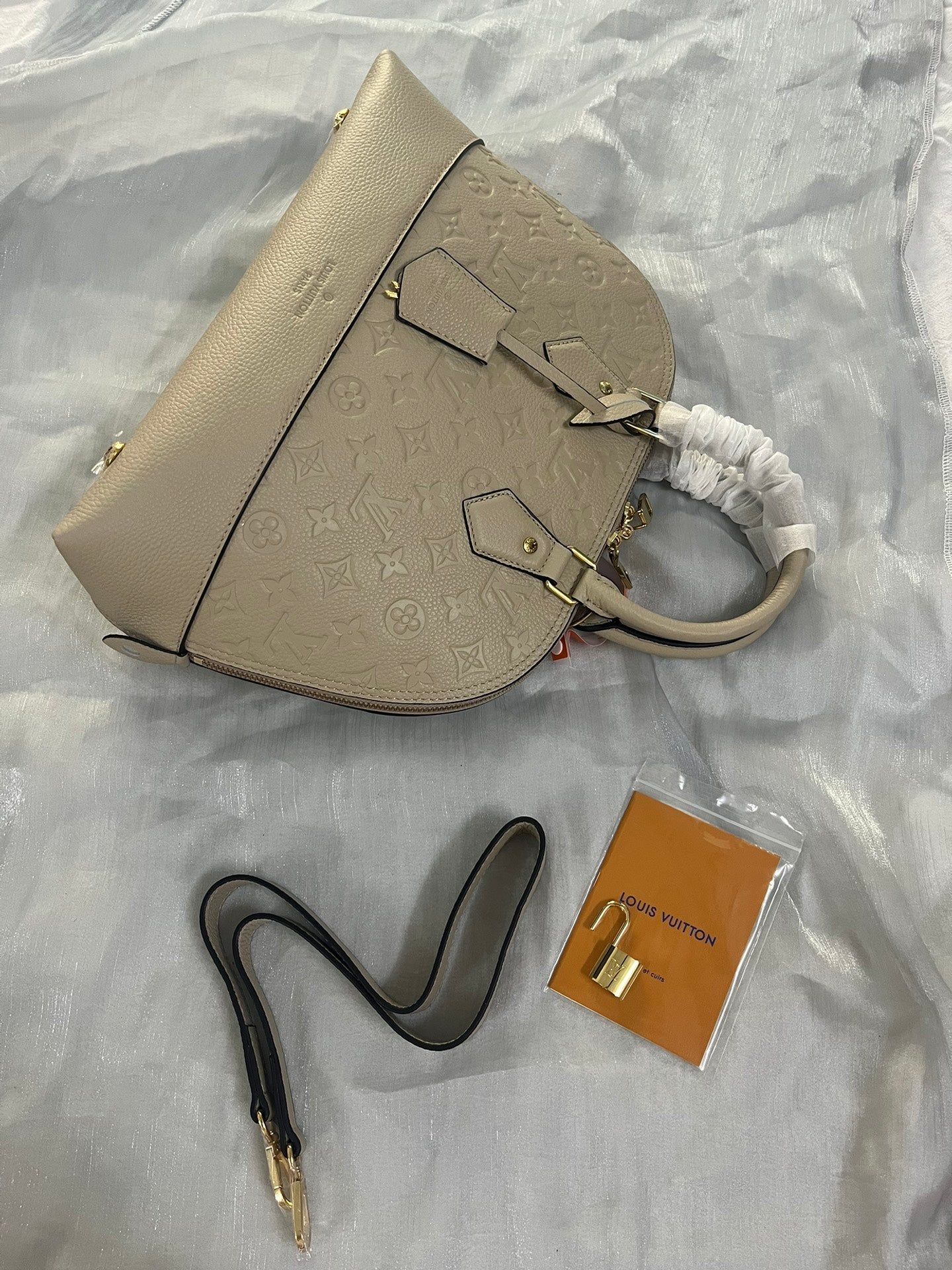 Louis Vuitton Neo Alma PM Monogram Empreinte Leather Turtledove Handbag