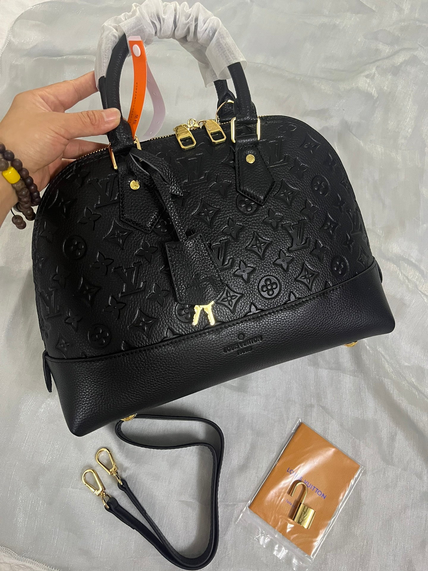 Luxury Black Embossed Leather Top Handle Handbag with Shoulder Strap