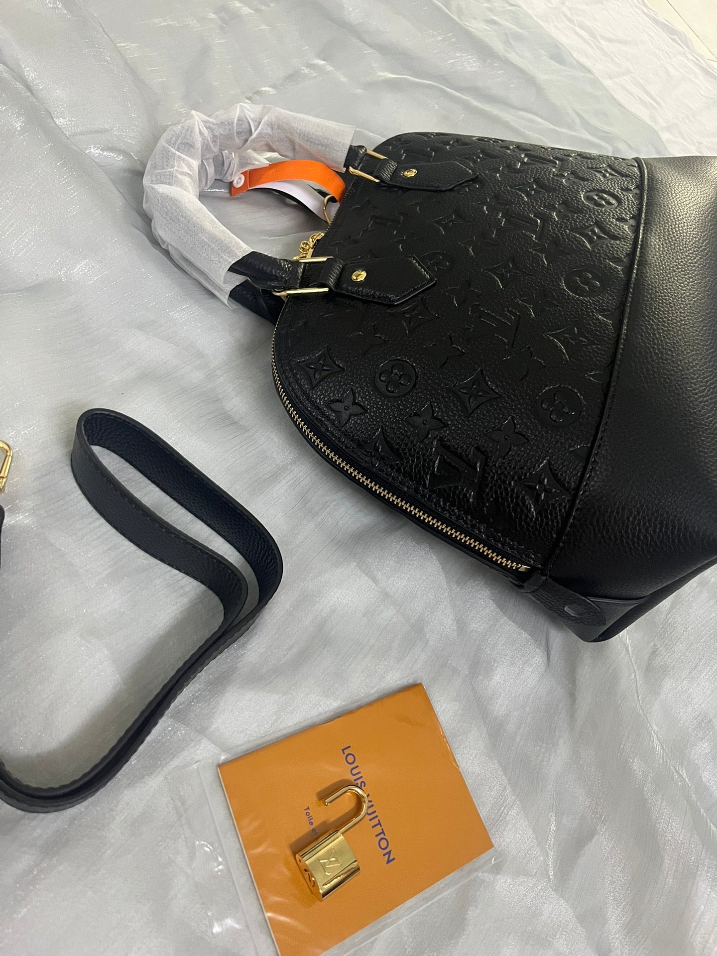 Luxury Black Embossed Leather Top Handle Handbag with Shoulder Strap