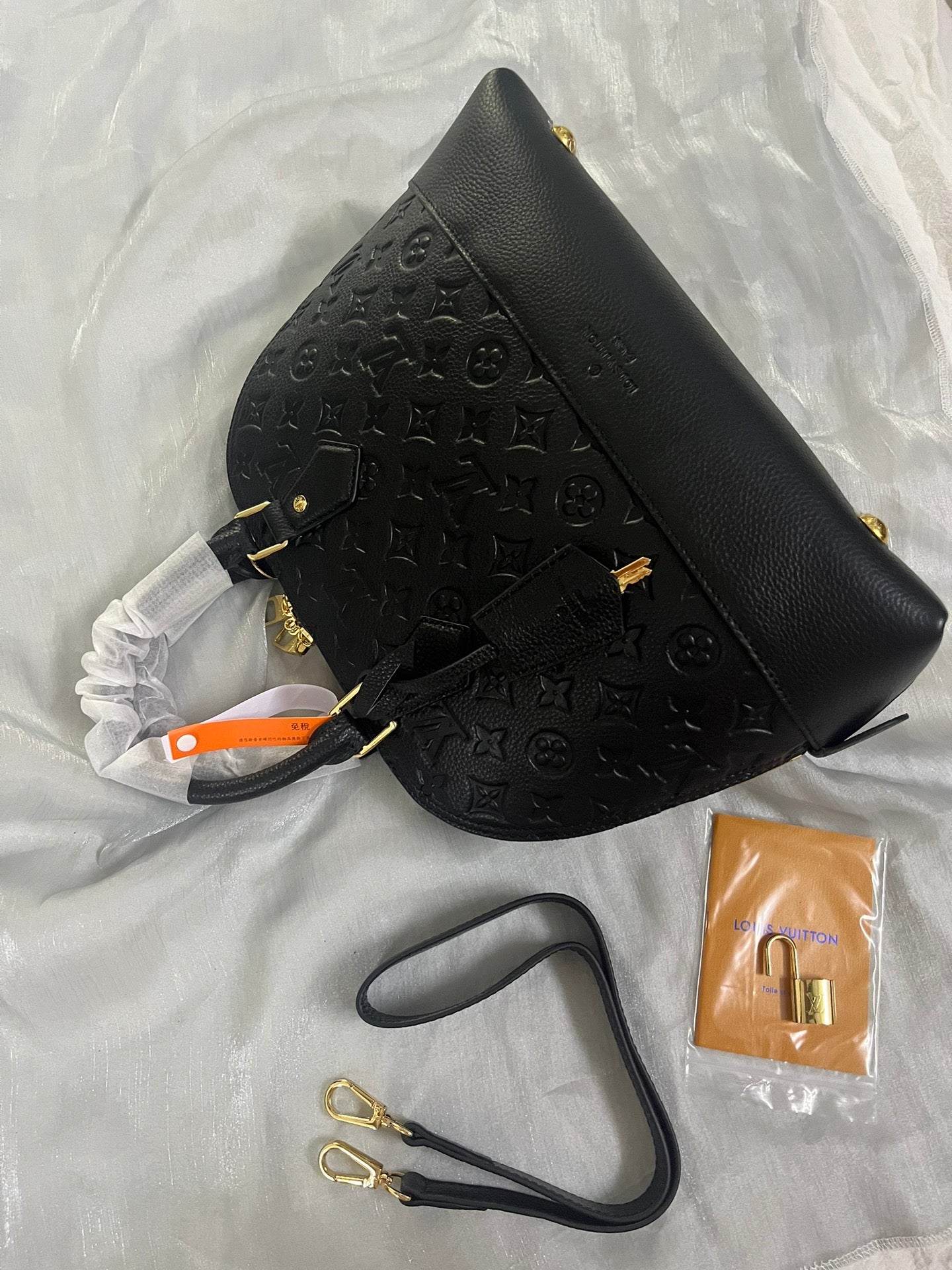 Luxury Black Embossed Leather Top Handle Handbag with Shoulder Strap