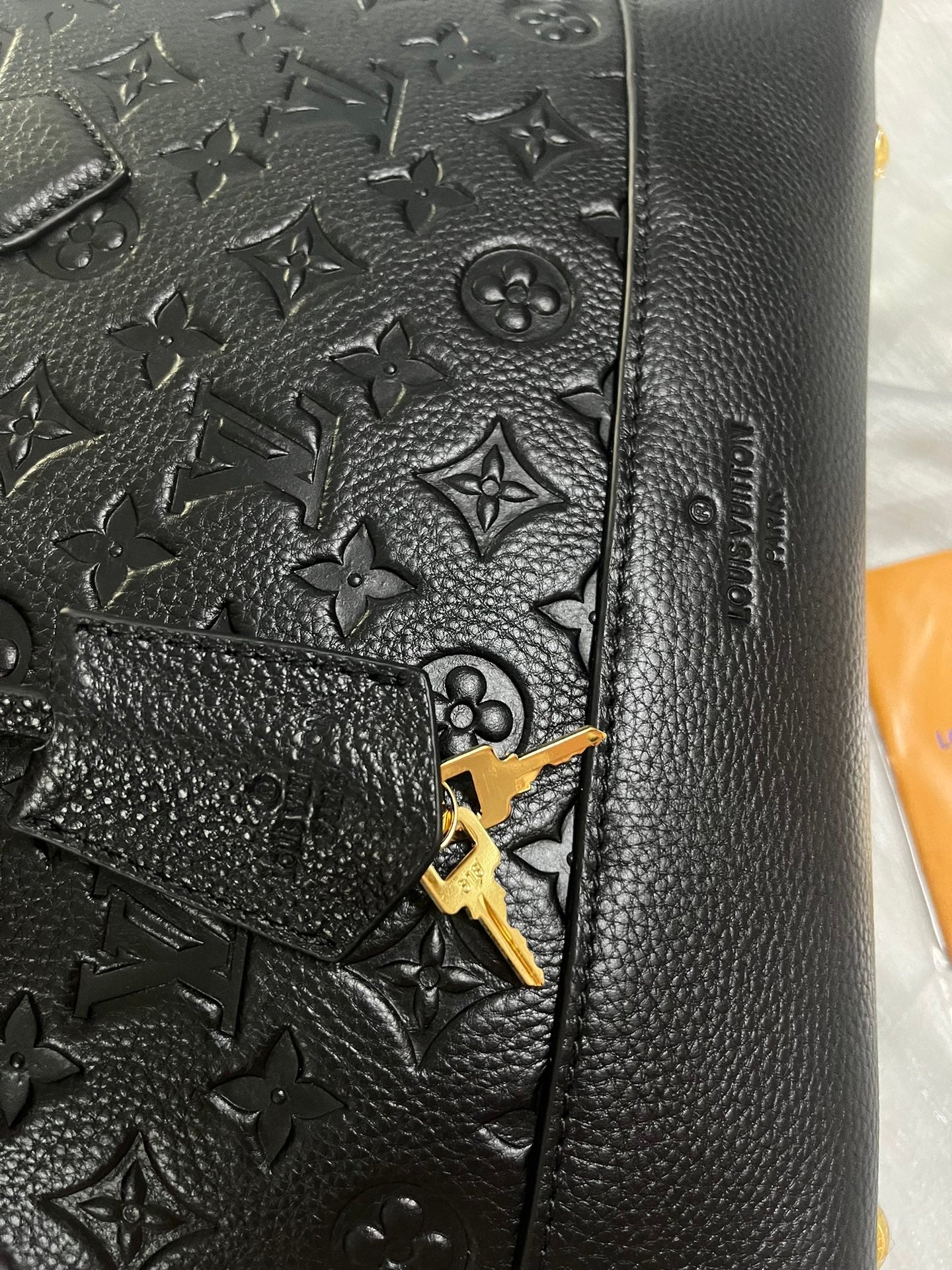 Luxury Black Embossed Leather Top Handle Handbag with Shoulder Strap