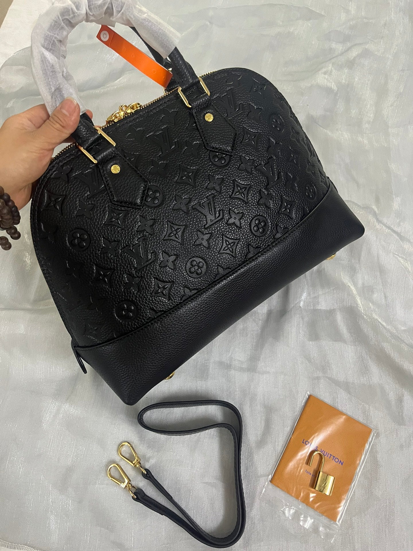 Luxury Black Embossed Leather Top Handle Handbag with Shoulder Strap