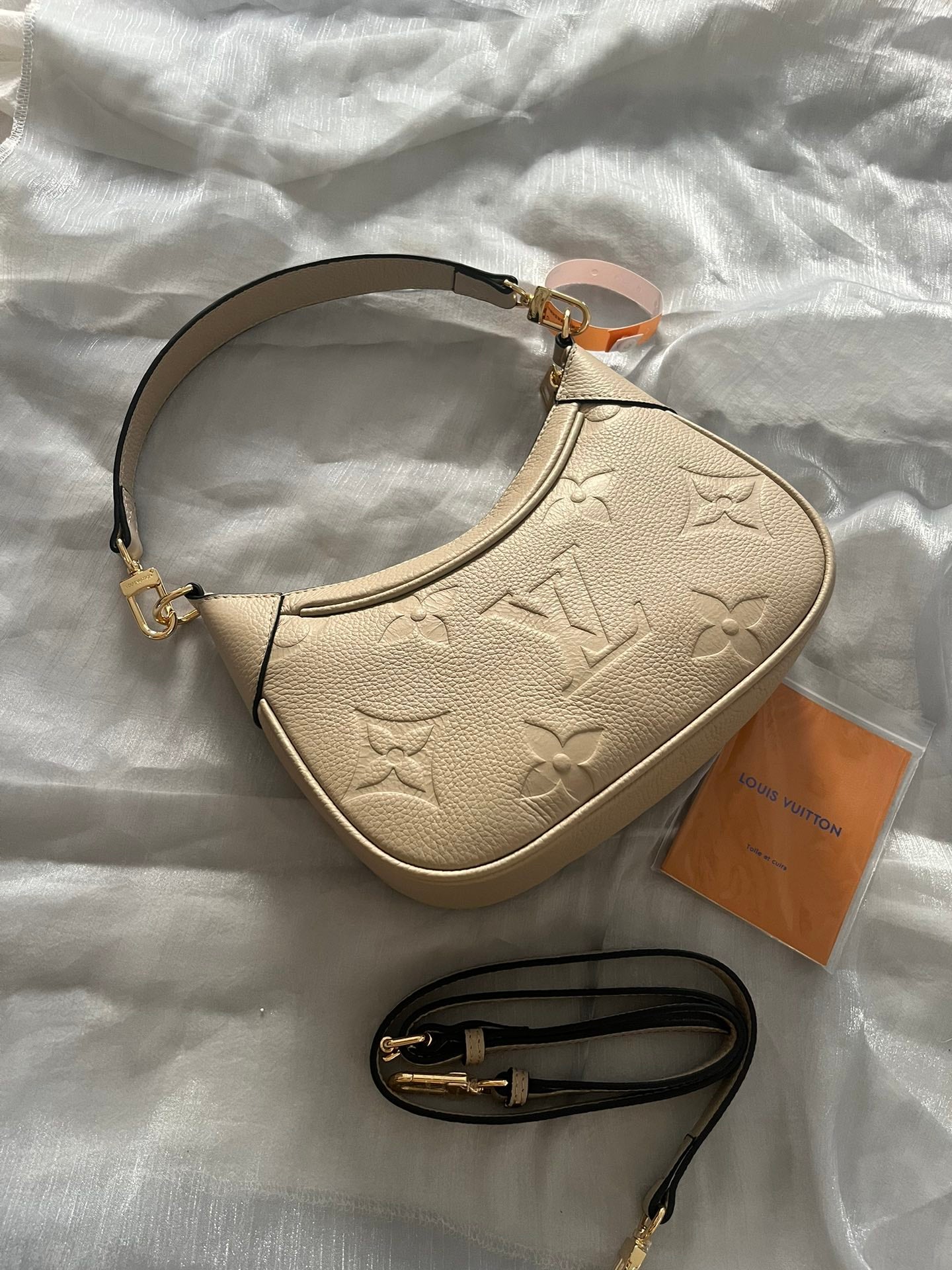 Louis Vuitton Bagatelle Monogram Empreinte Leather Cream Hobo Bag