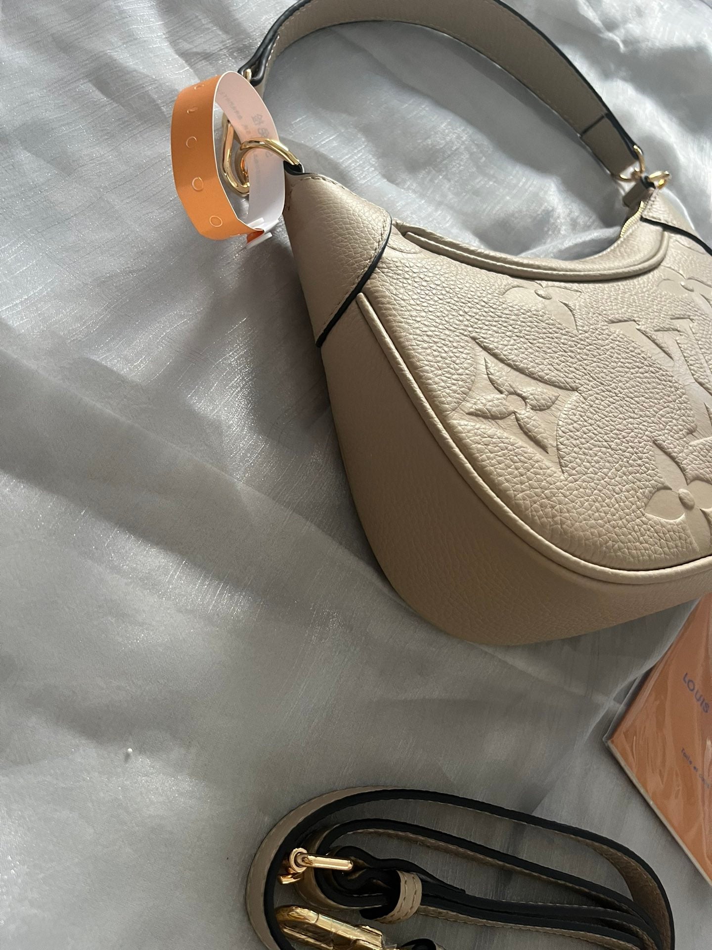 Louis Vuitton Embossed Monogram Leather Crescent Shoulder Bag with Detachable Strap