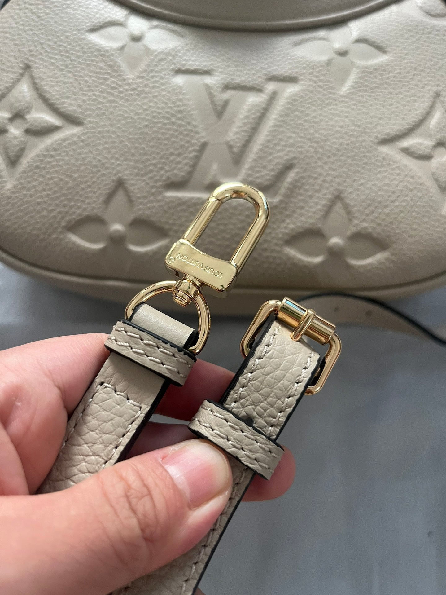 Louis Vuitton Bagatelle Monogram Empreinte Leather Cream Hobo Bag
