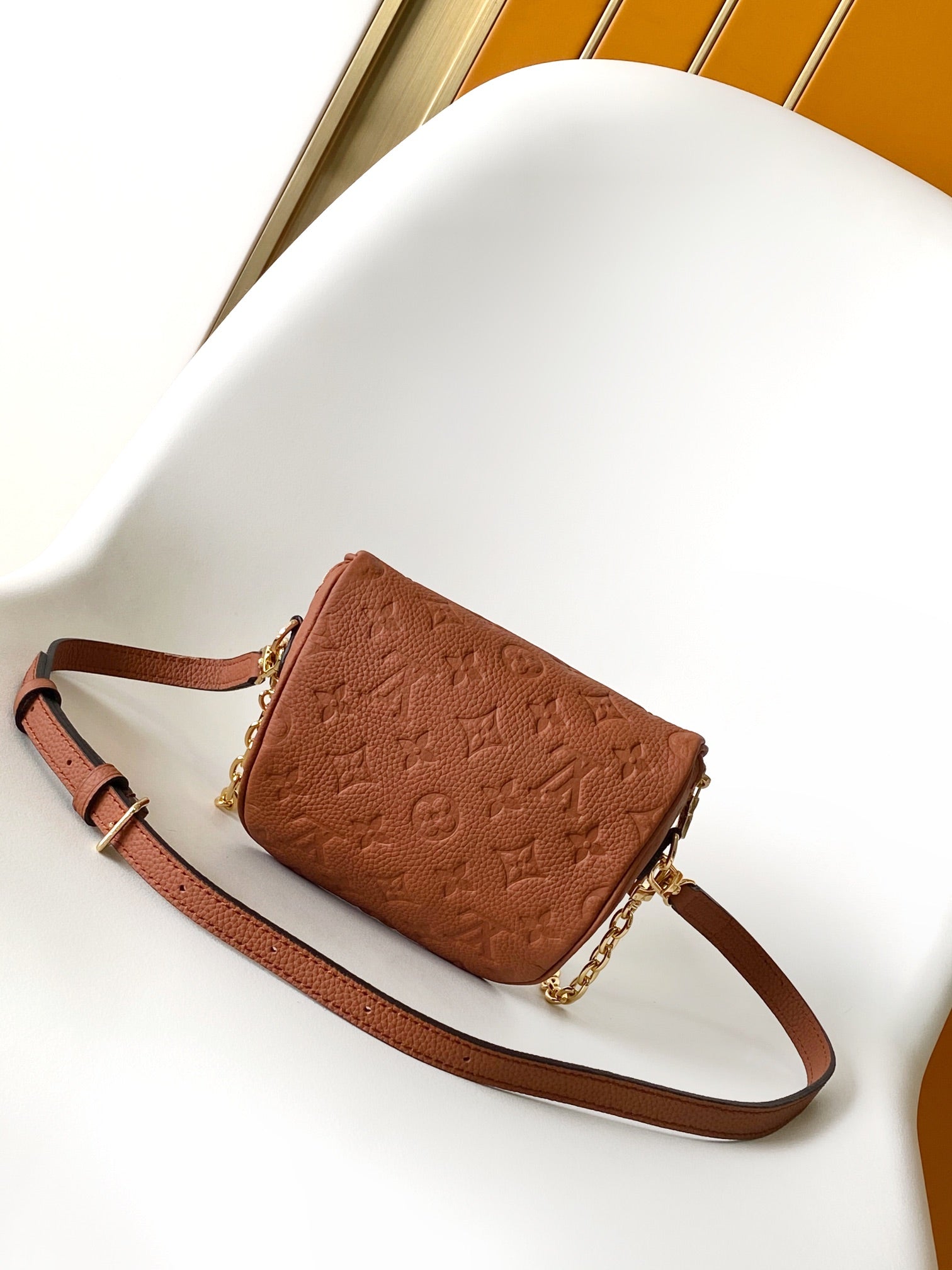 Louis Vuitton Mini Bumbag Monogram Empreinte Leather Cognac