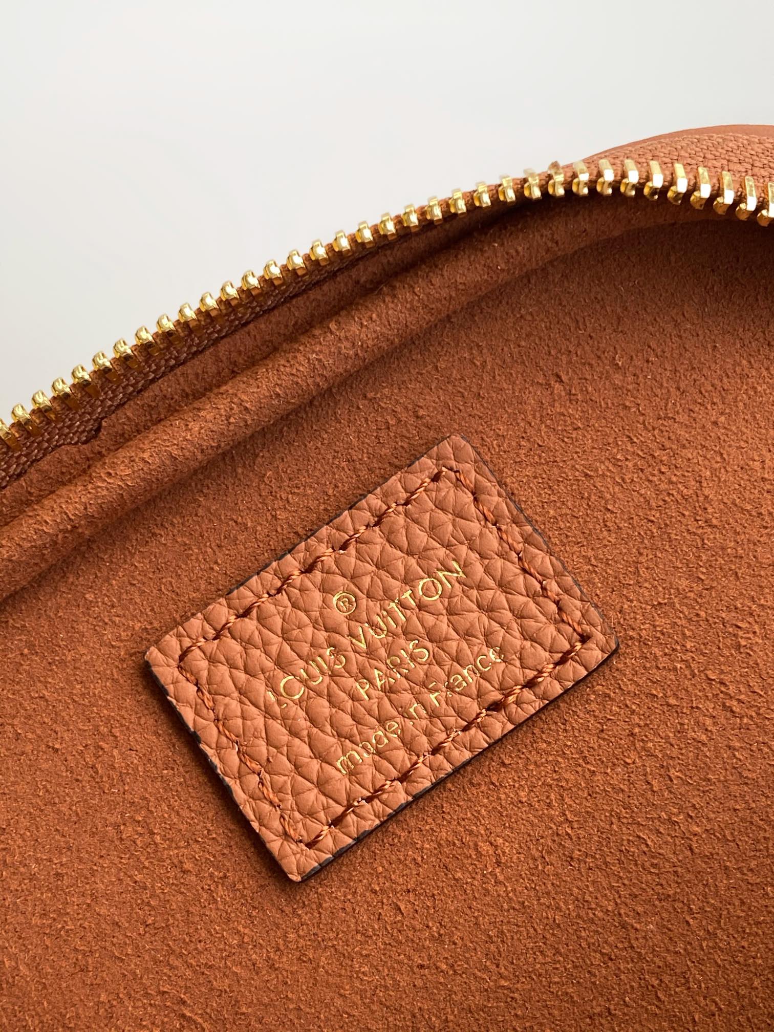 Louis Vuitton Mini Bumbag Monogram Empreinte Leather Cognac