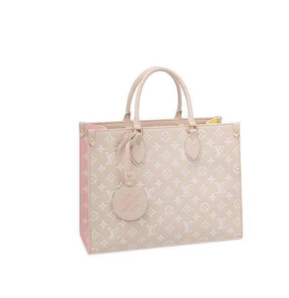 Louis Vuitton OnTheGo MM Monogram Empreinte Leather Tote Bag - Pink