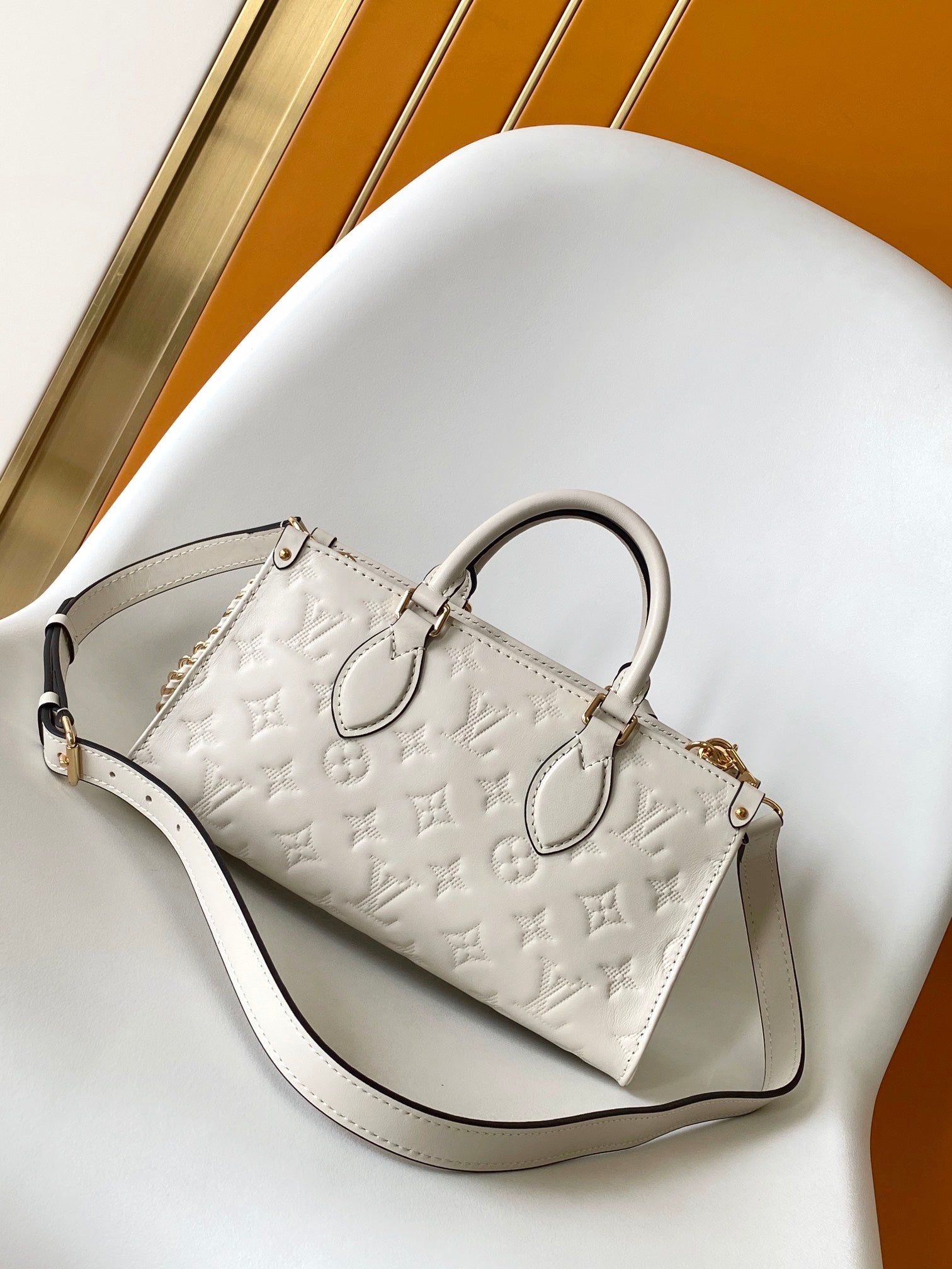 Louis Vuitton Petit Palais Monogram Empreinte Leather Handbag - White