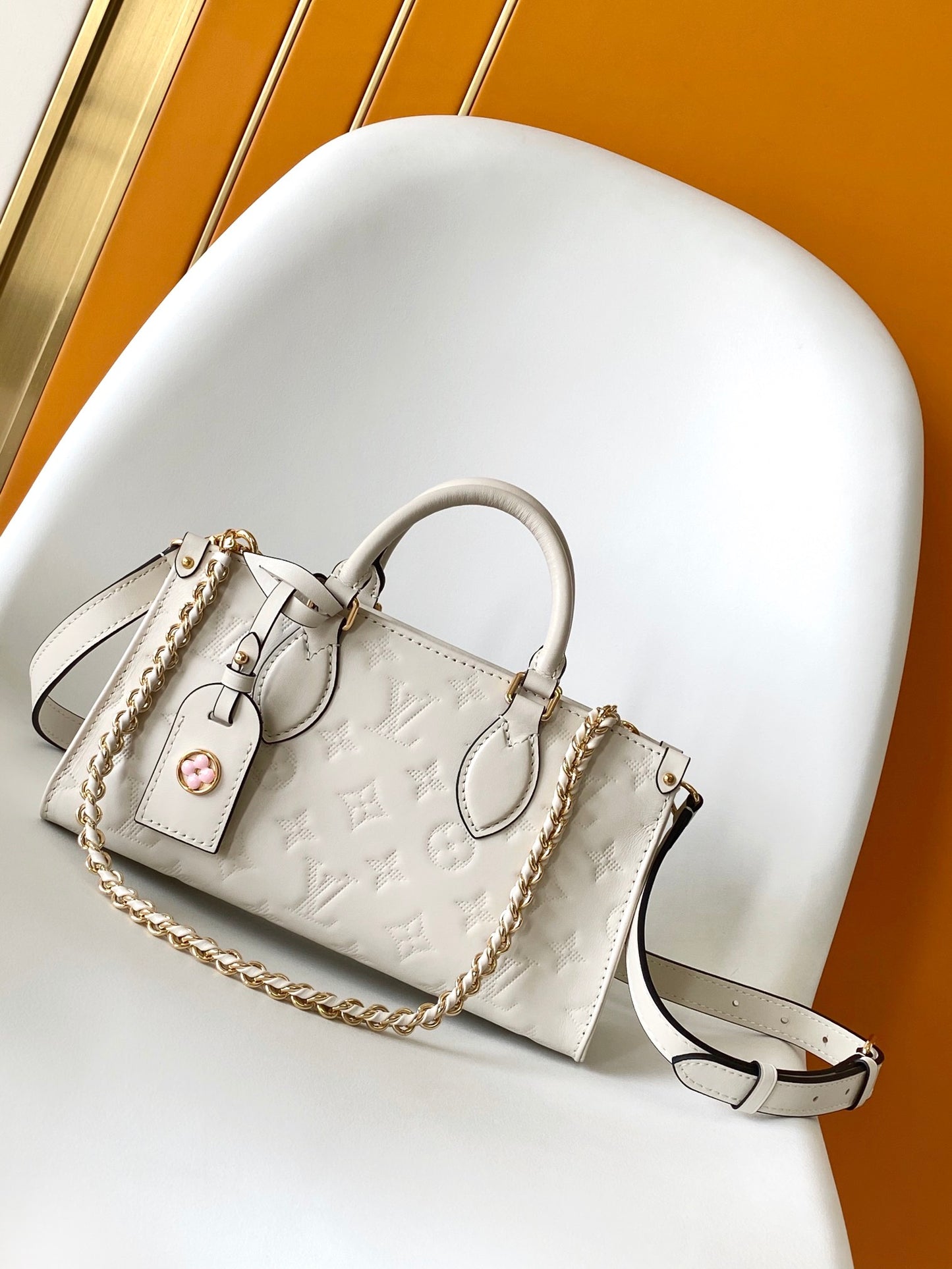 Louis Vuitton Petit Palais Monogram Empreinte Leather Handbag - White