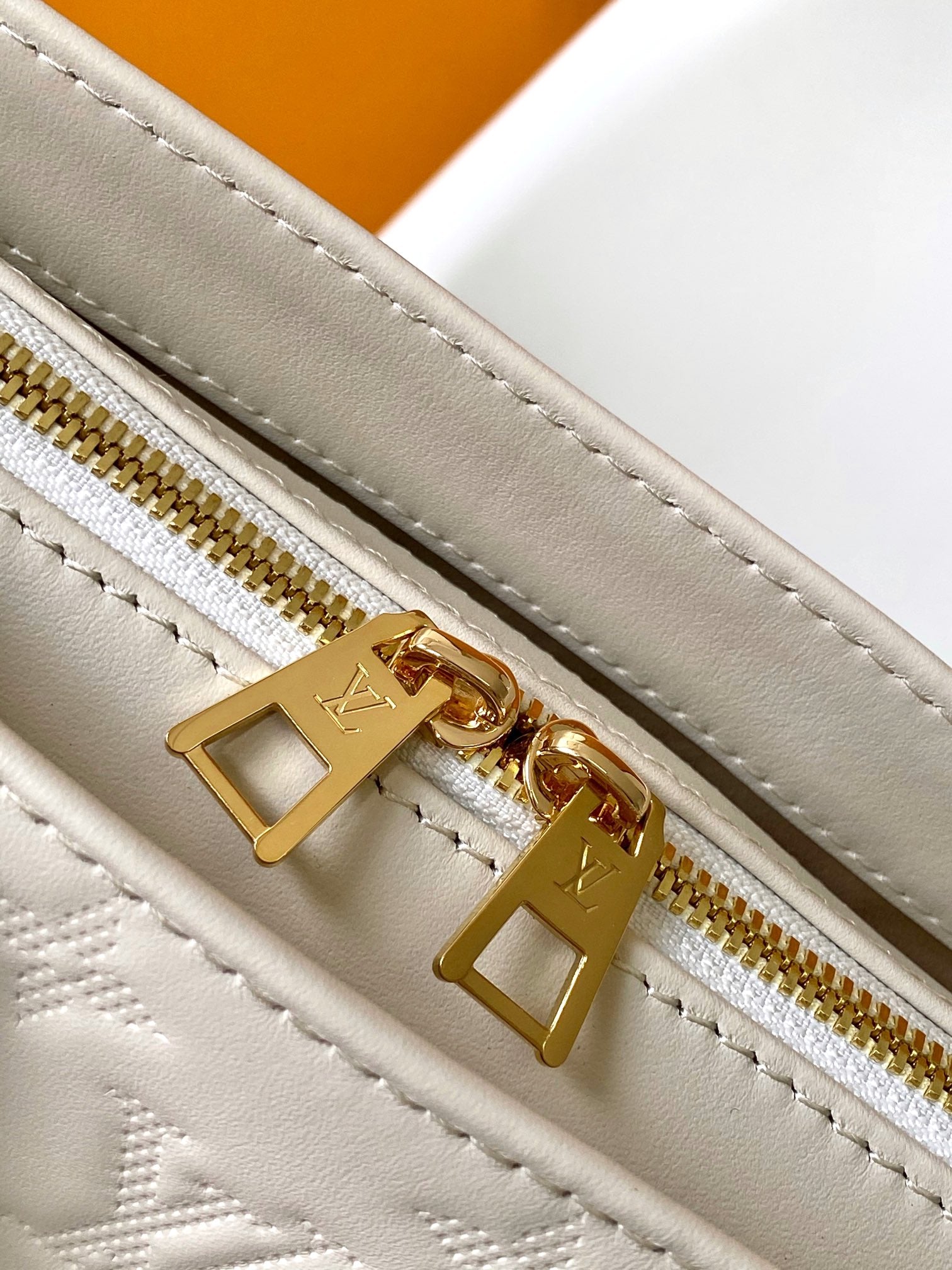 Louis Vuitton Petit Palais Monogram Empreinte Leather Handbag - White