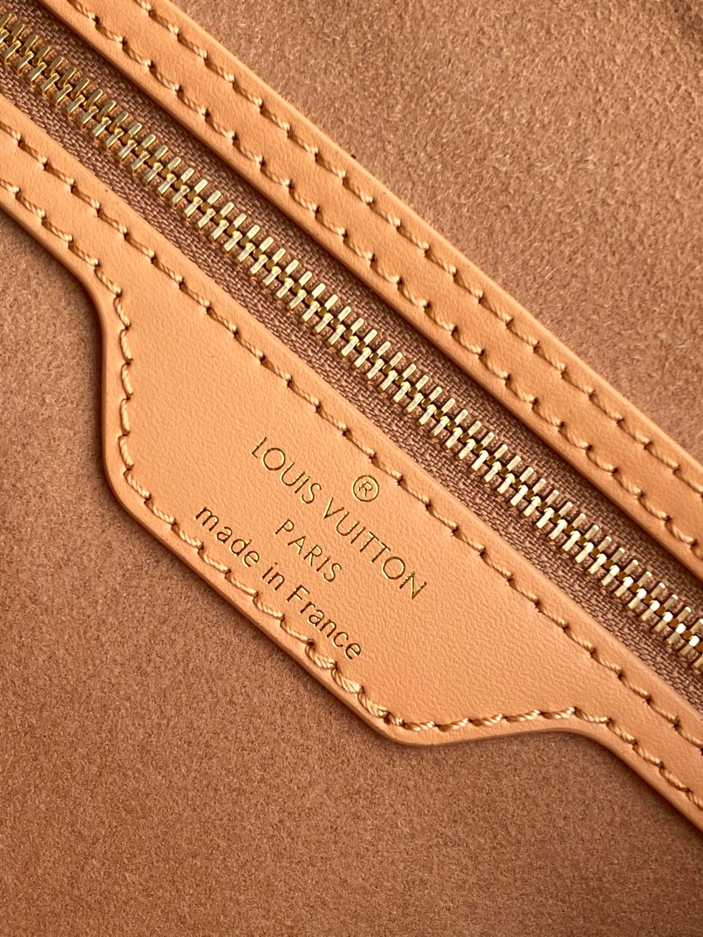 Elegant Tan Monogram Embossed Leather Satchel Bag with Top Handles and Crossbody Strap