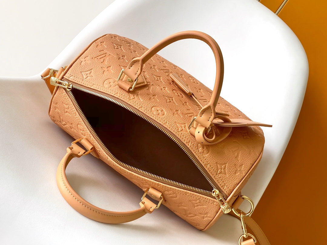Elegant Tan Monogram Embossed Leather Satchel Bag with Top Handles and Crossbody Strap