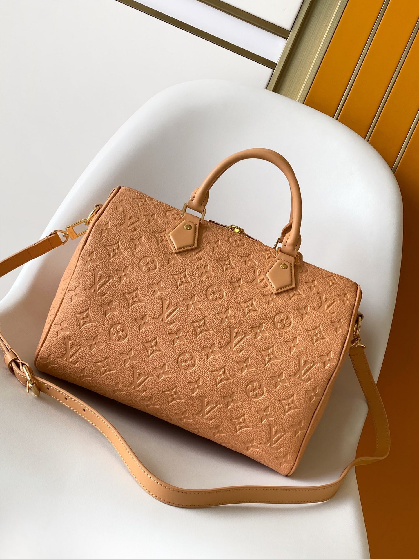 Elegant Tan Monogram Embossed Leather Satchel Bag with Top Handles and Crossbody Strap