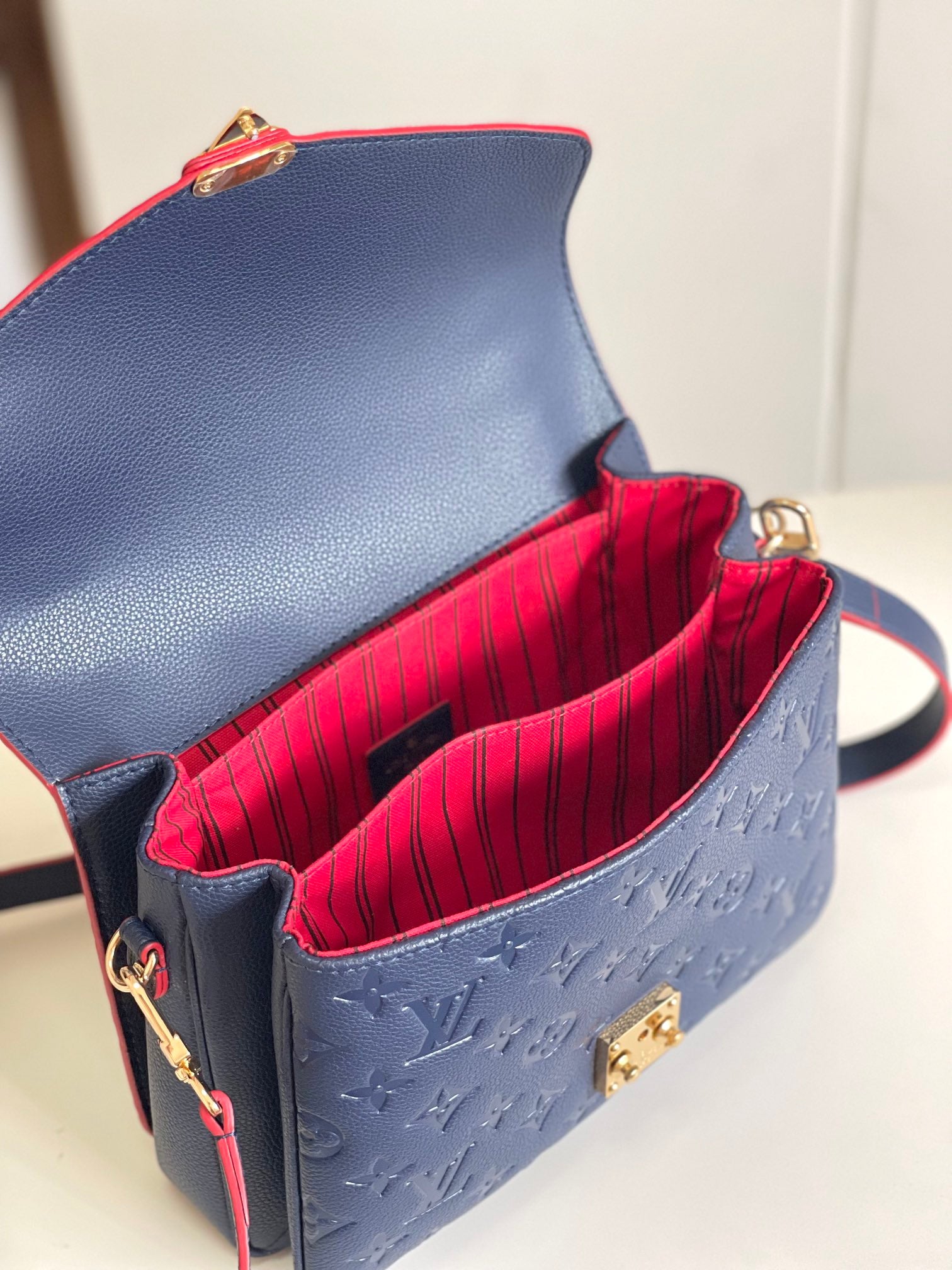 Louis Vuitton Pochette Métis Monogram Empreinte Leather Handbag - Marine Rouge