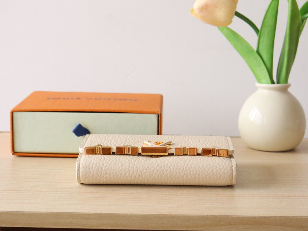 Louis Vuitton Capucines Compact Wallet - Cream Grained Leather with Gold LV Initials
