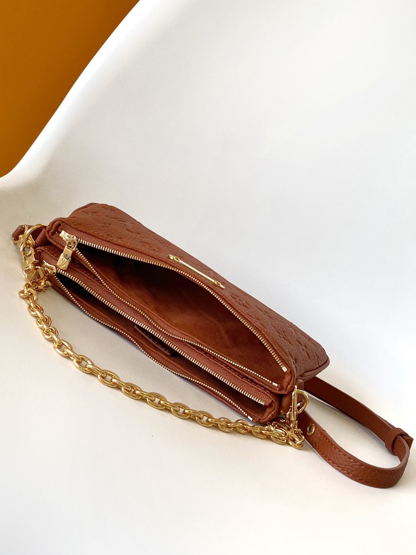 Louis Vuitton Bagatelle Monogram Empreinte Leather Handbag - Cognac Brown