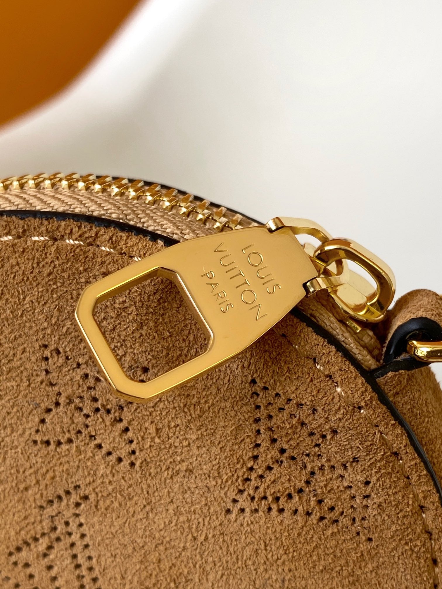 Louis Vuitton Bella Bucket Bag in Camel Mahina Calfskin with Shearling Trim