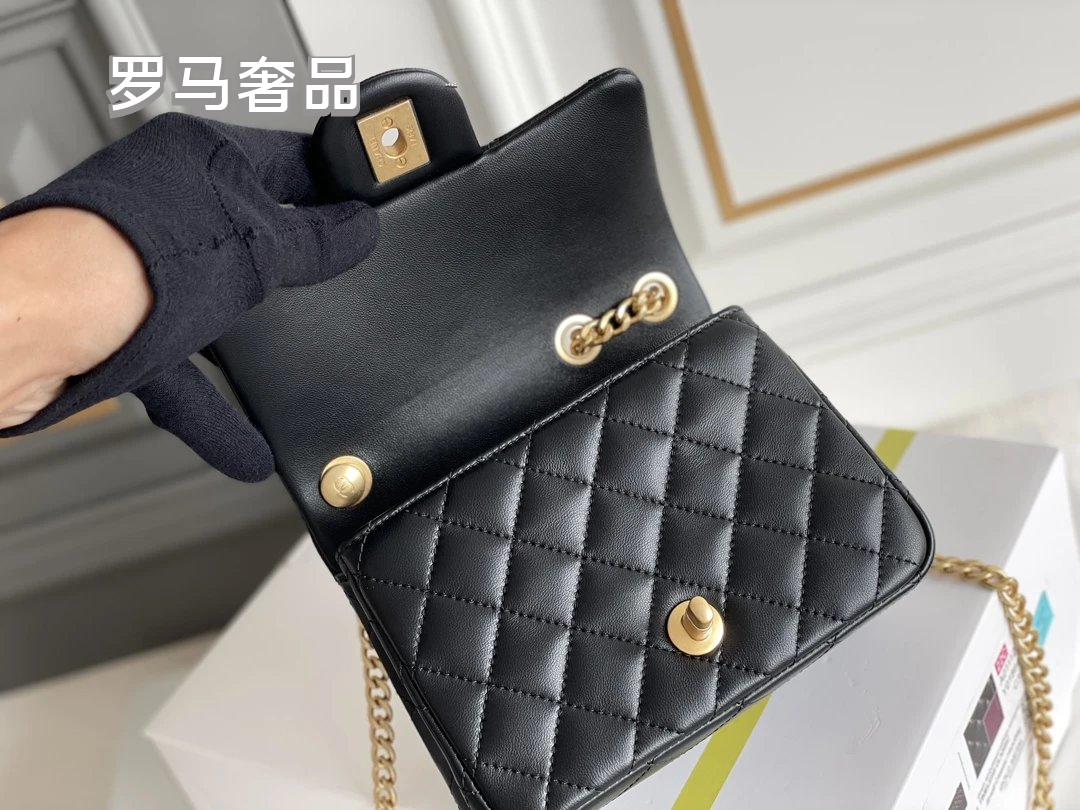 Black Quilted Leather Mini Flap Bag with Gold-Tone Chain and Camellia Charm
