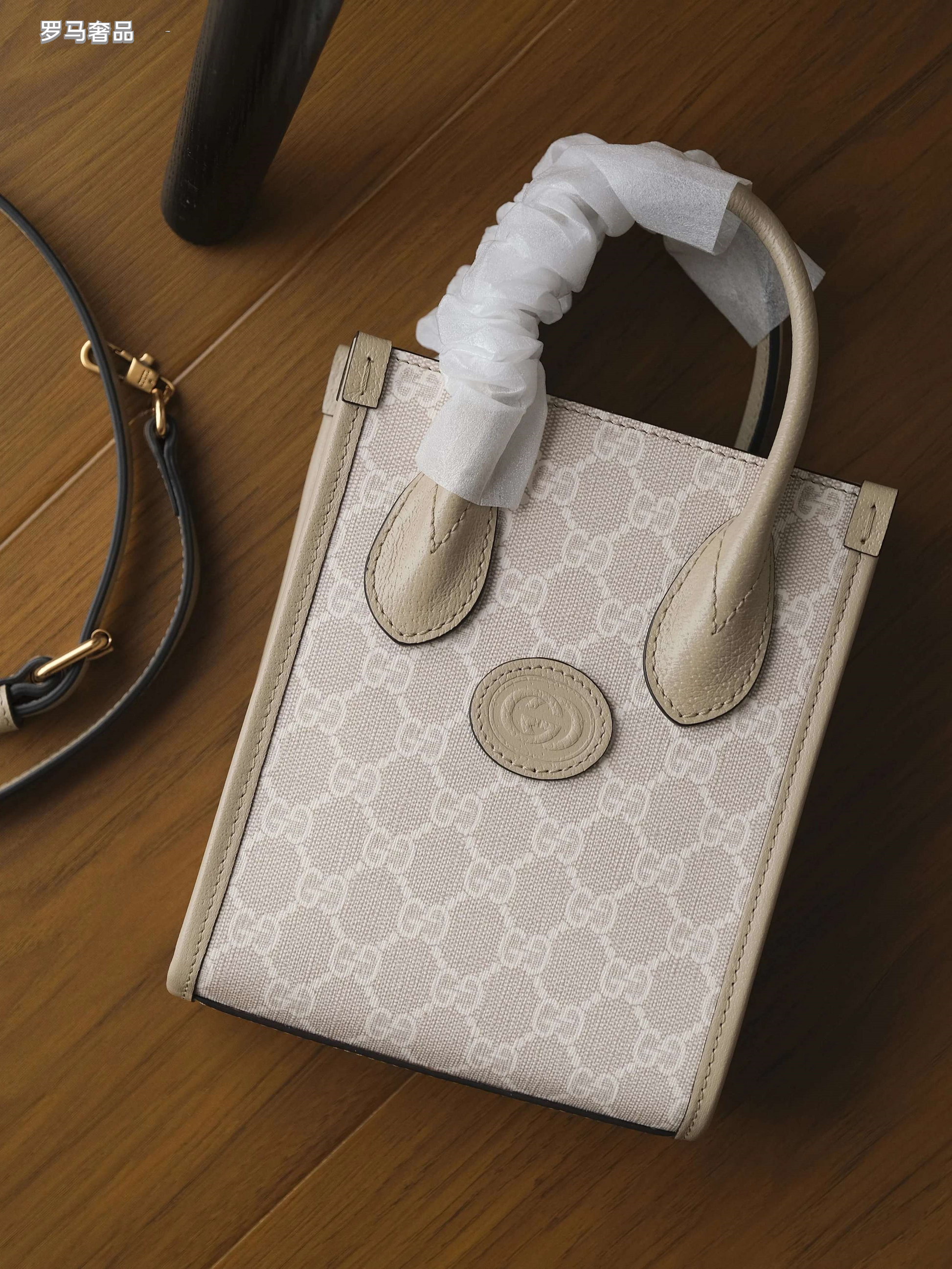 Gucci Elegant Cream Monogram Mini Tote Bag with Top Handles and Crossbody Strap