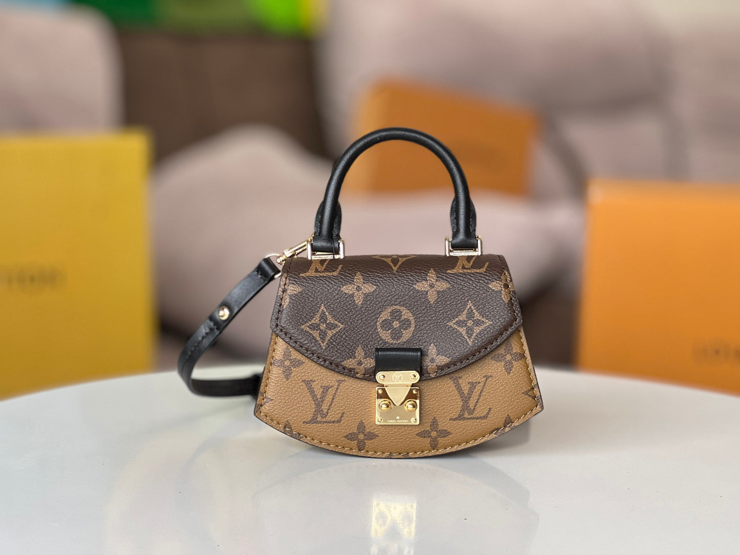 Louis Vuitton Tilcit Handbag Monogram and Monogram Reverse Canvas