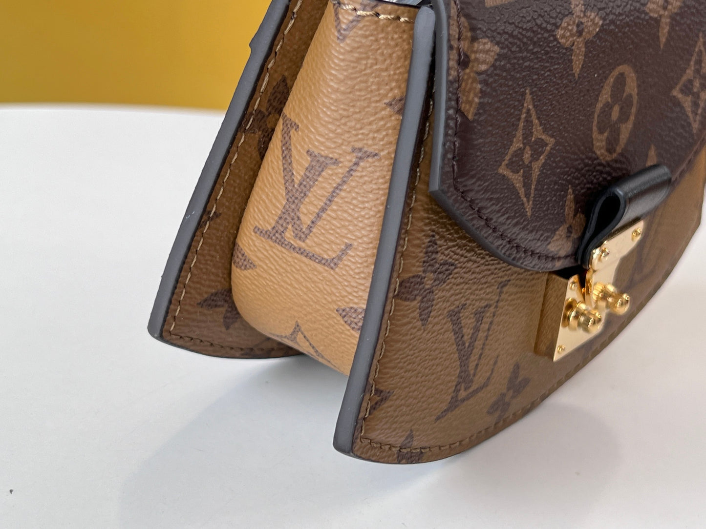 Louis Vuitton Tilcit Handbag Monogram and Monogram Reverse Canvas