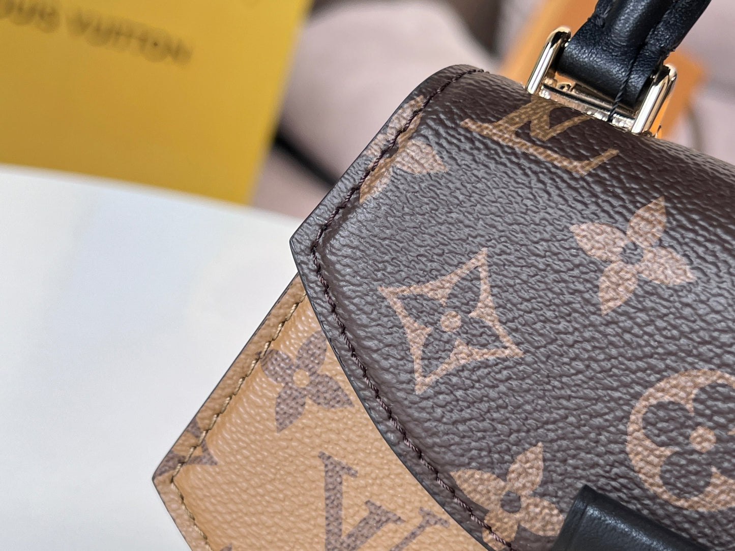 Louis Vuitton Tilcit Handbag Monogram and Monogram Reverse Canvas