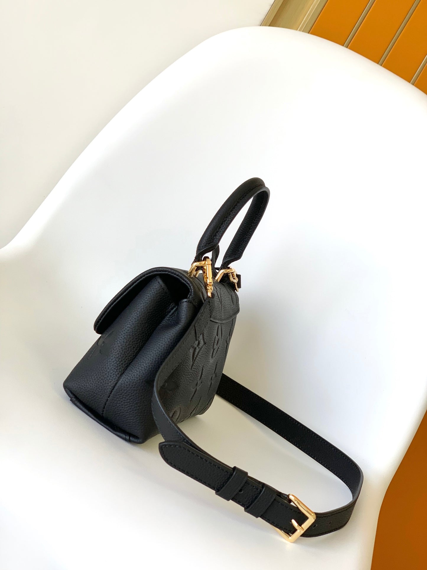 Louis Vuitton Madeleine MM Monogram Empreinte Leather Handbag - Black