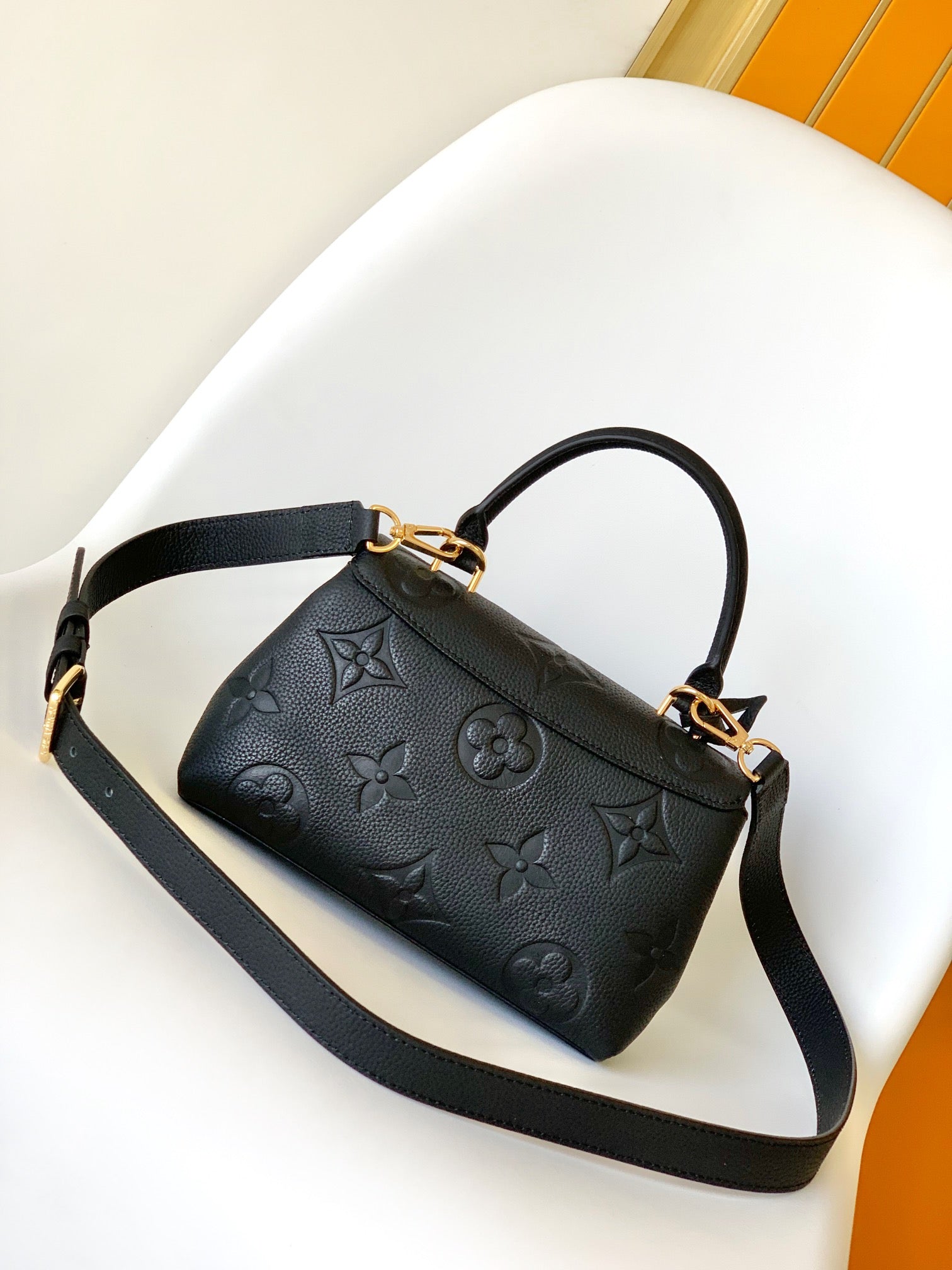 Louis Vuitton Madeleine MM Monogram Empreinte Leather Handbag - Black
