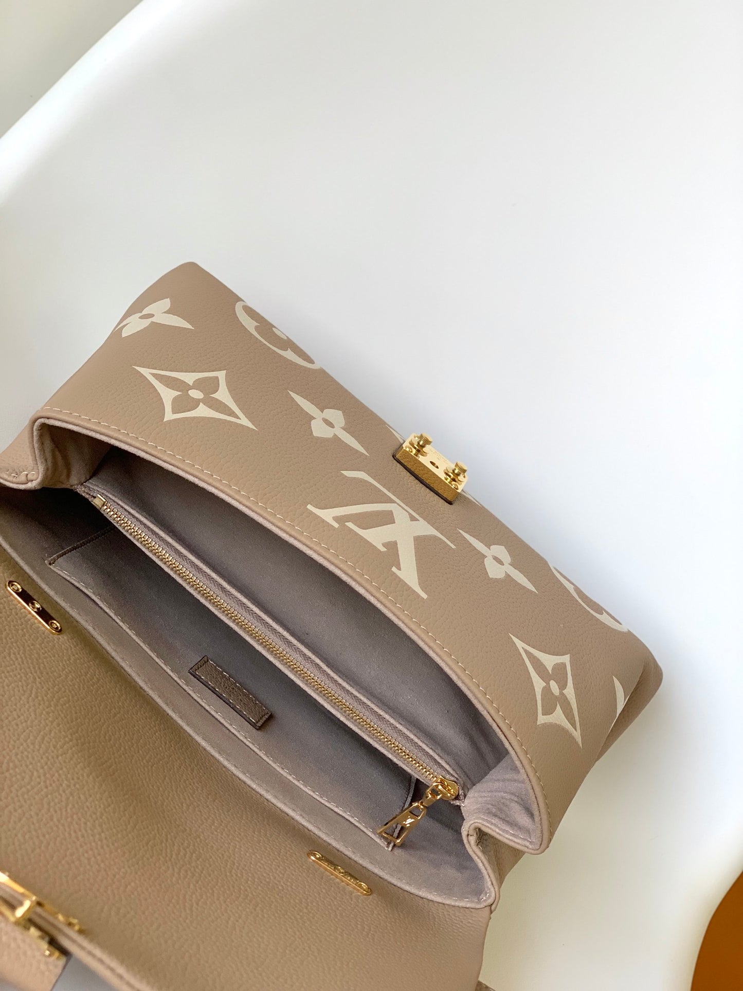 Louis Vuitton Madeleine BB Monogram Empreinte Leather Bag - Tourterelle / Crème