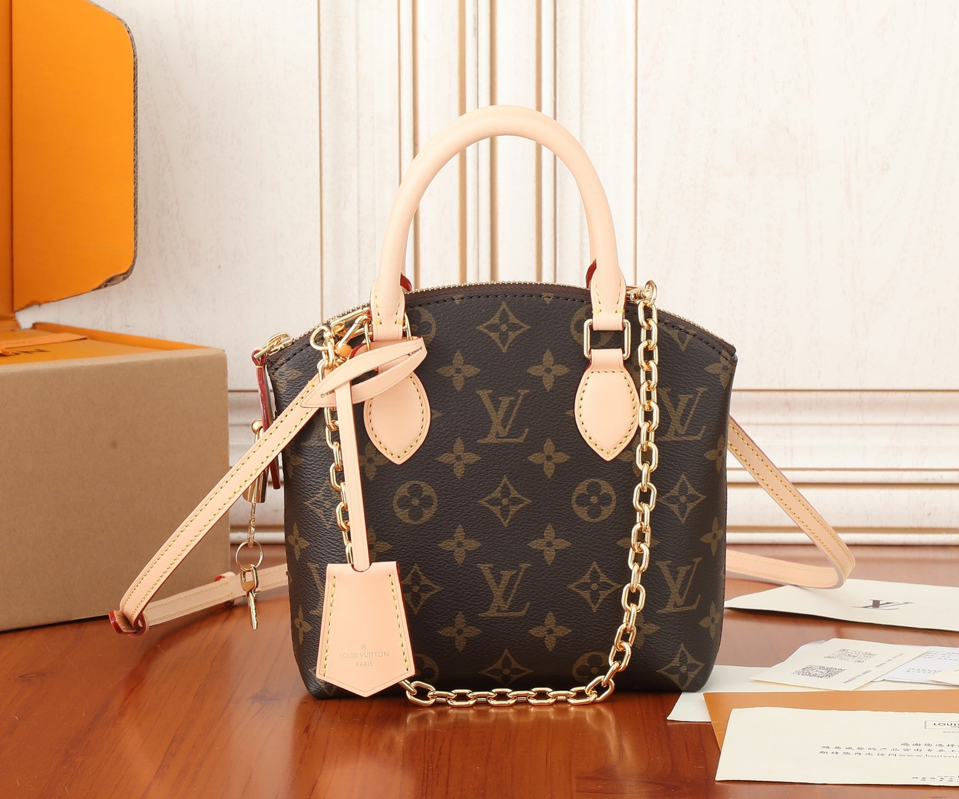 Louis Vuitton Alma BB Monogram Canvas Handbag