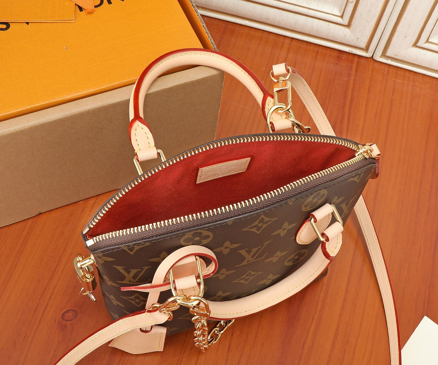 Louis Vuitton Alma BB Monogram Canvas Handbag