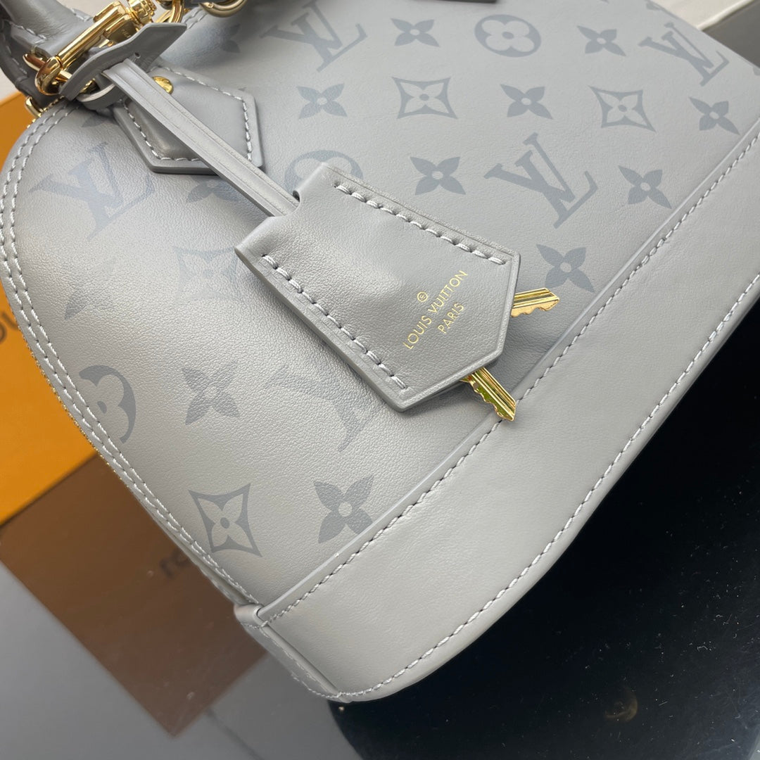 Louis Vuitton Alma BB Monogram Empreinte Leather Handbag - Grey