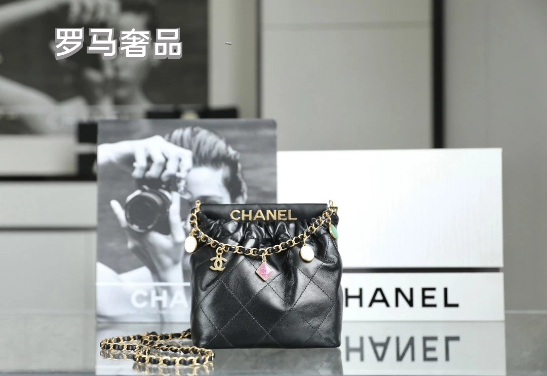 Chanel 22 Small Handbag Black Quilted Leather Gold-Tone Charms