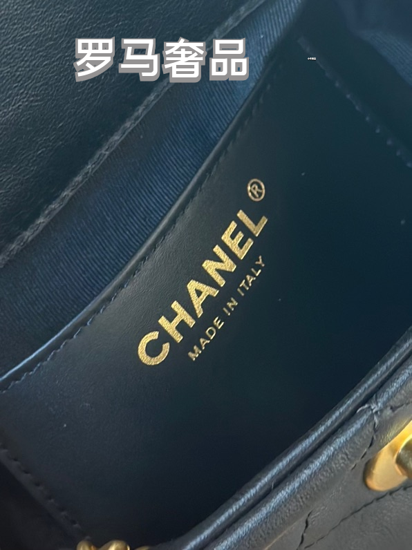 Chanel Vintage Mini Quilted Leather Backpack with Medallion Charm Chain Detail - Black/Gold