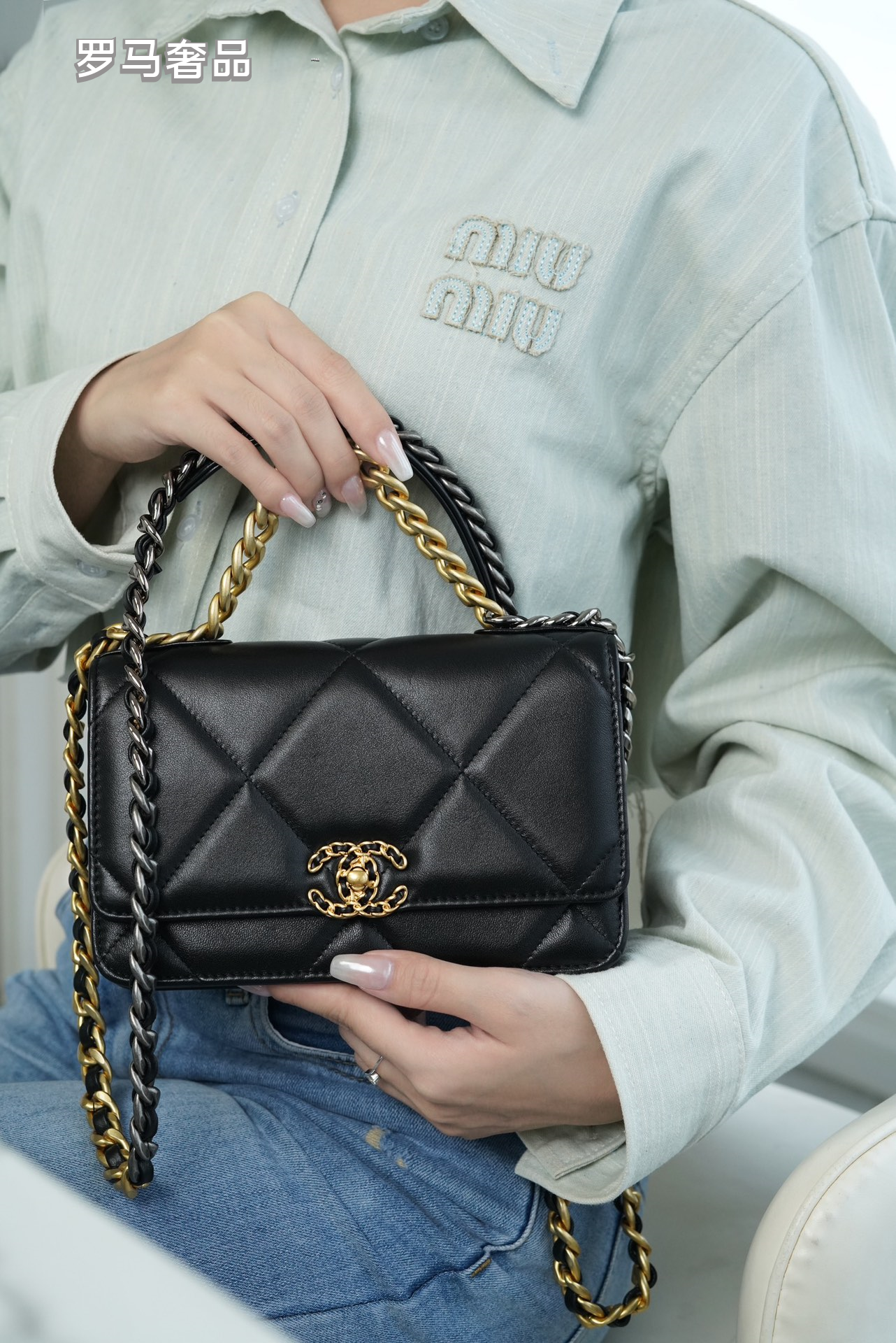 Elegant Black Quilted Leather Shoulder Bag with Gold-Tone Chain Strap