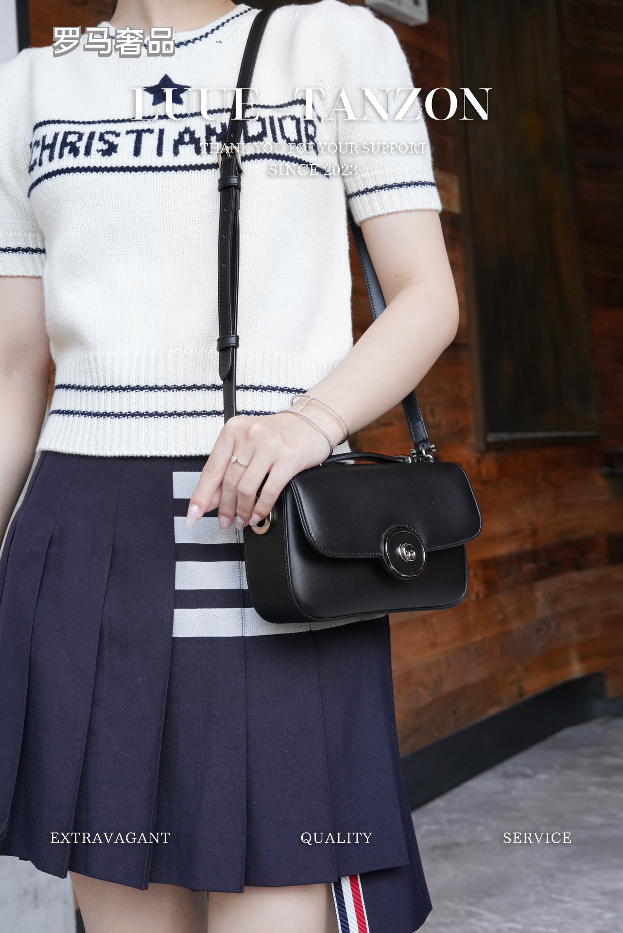 Gucci Classic Black Leather Shoulder Bag with Silver Oval Logo Buckle