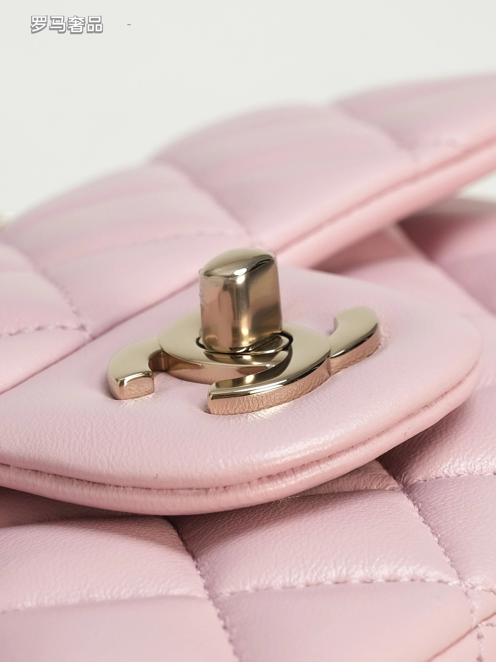 Pink Quilted Top Handle Handbag with Gold-Tone Chain Strap